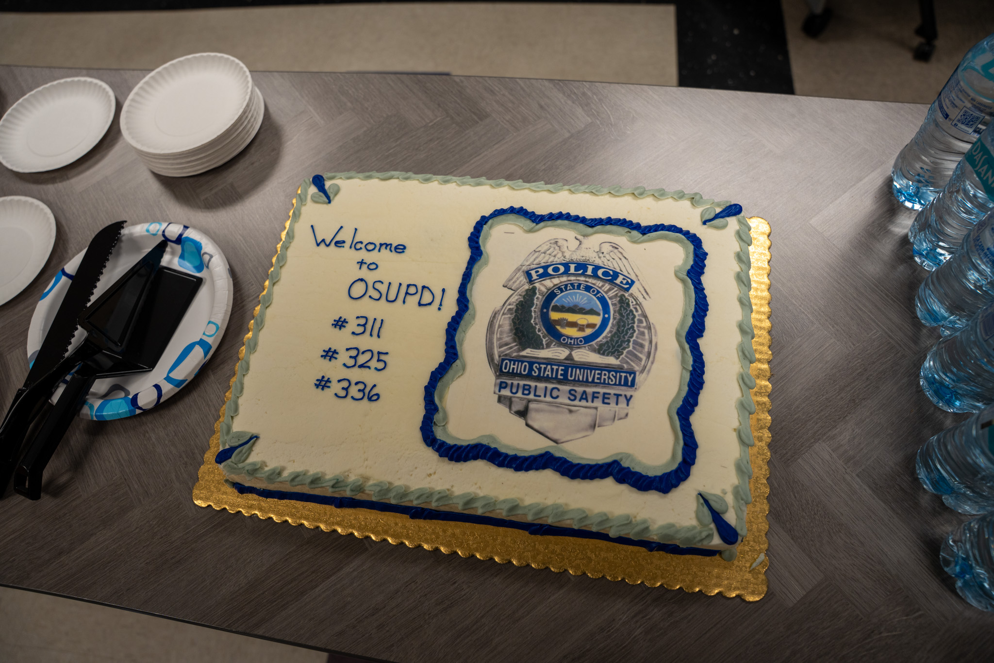 A cake that says 'Welcome to OSUPD #311, #325, #336
