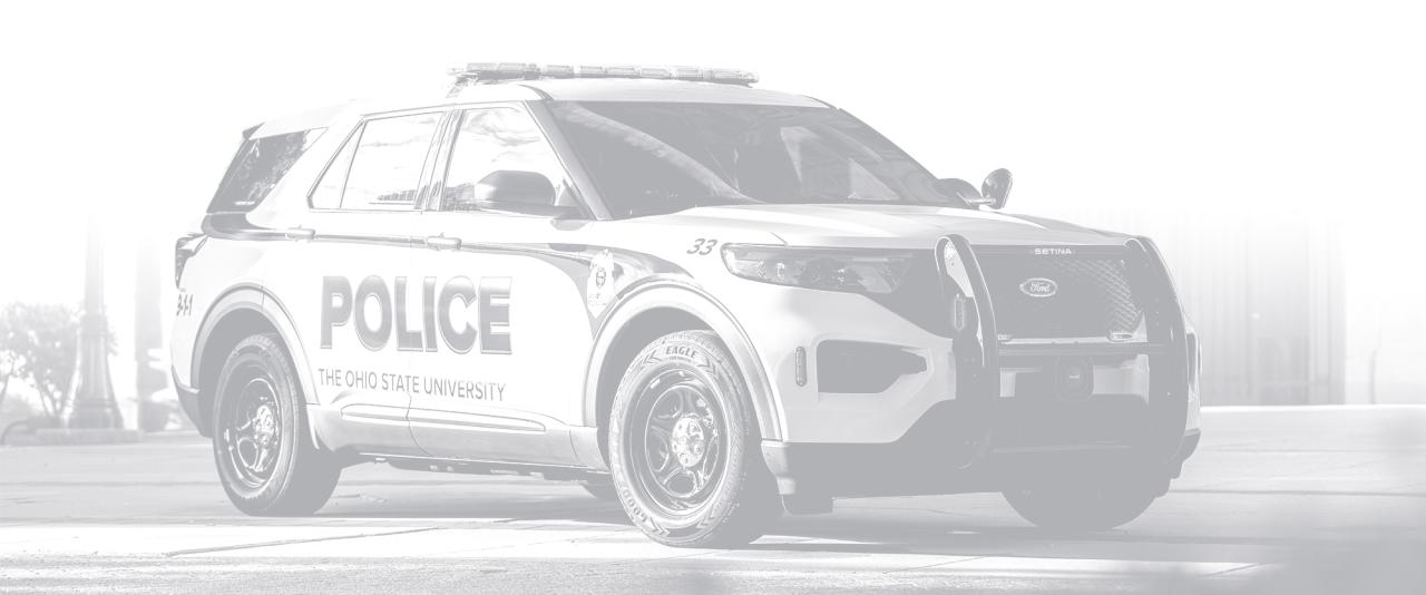 Grayscale photo of an Ohio State University Police Cruiser