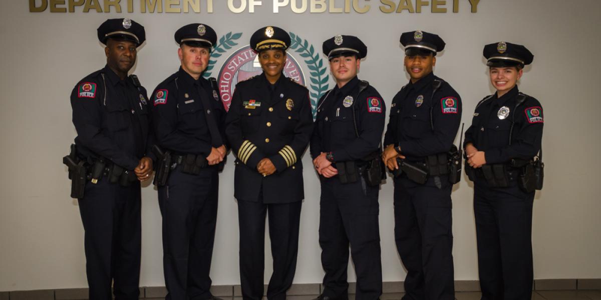 Interim Chief Kimberly Spears-McNatt standing with other officers at the recognition event