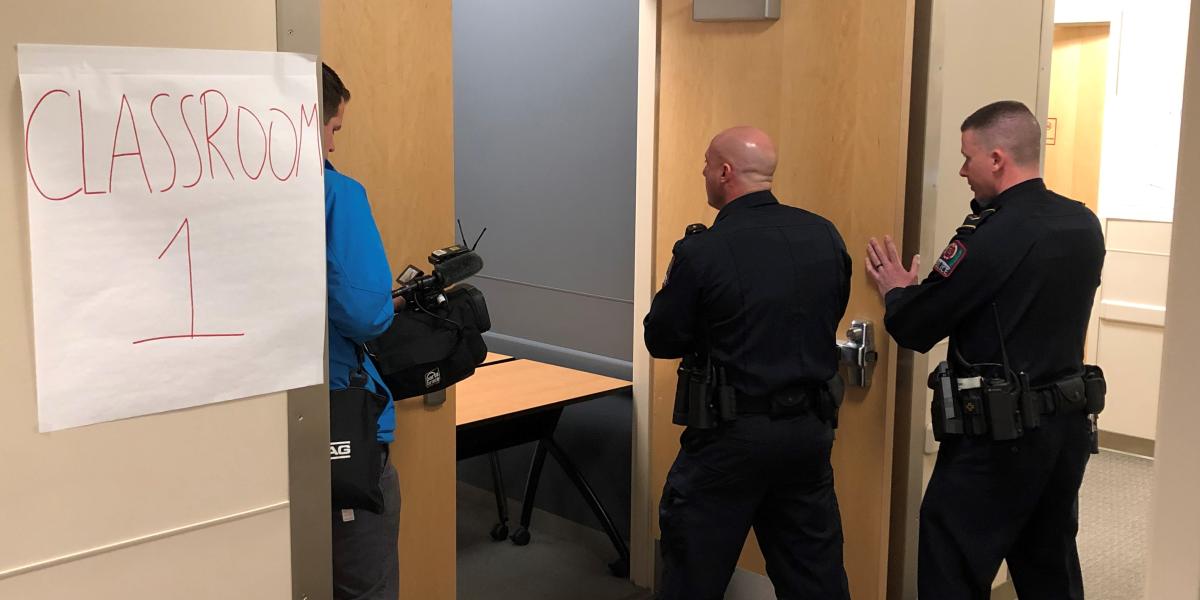 screen grab of active shooter training, three officers going though a door