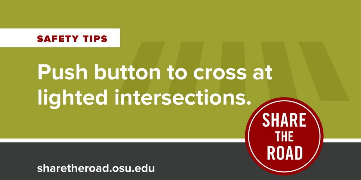a graphic of safety tips, namely push button to cross at lighted intersections