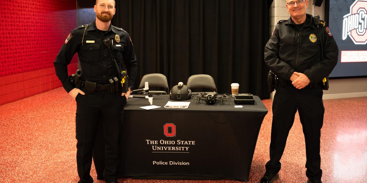 Lt. Bruce Allen and Chief Dennis Jeffrey smile for a photo.