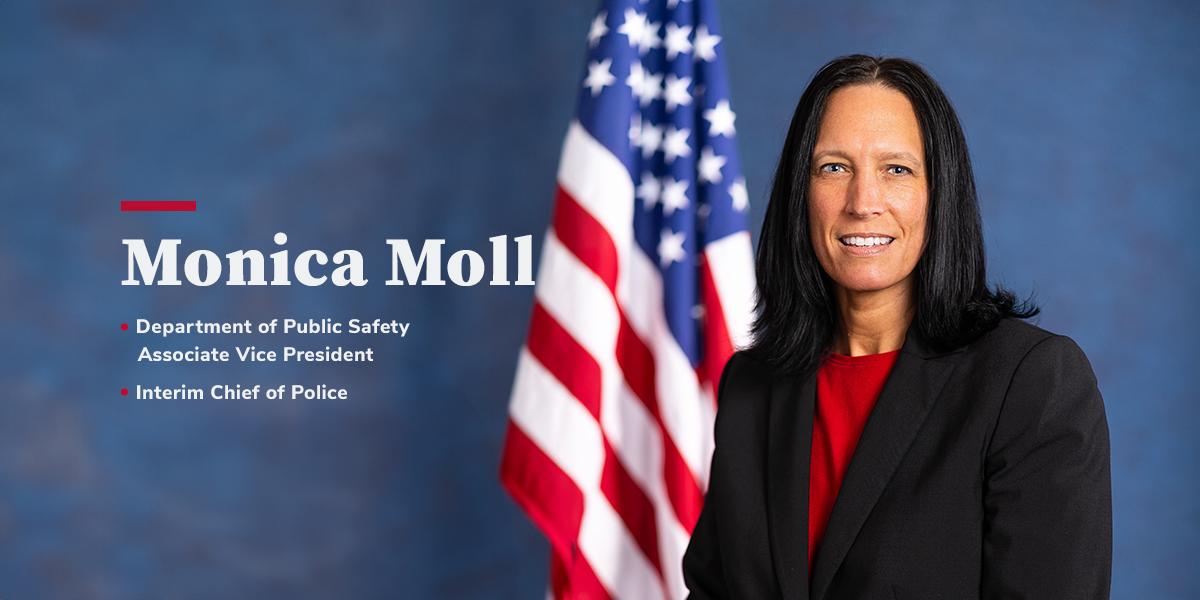 Monica Moll next to American flag