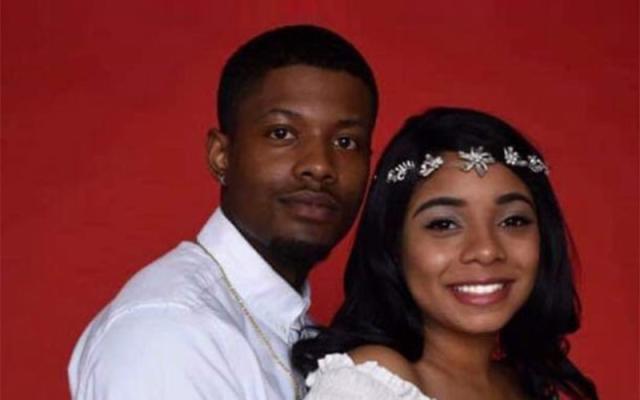 man wearing white shirt and woman wearing white shirt with flower headband