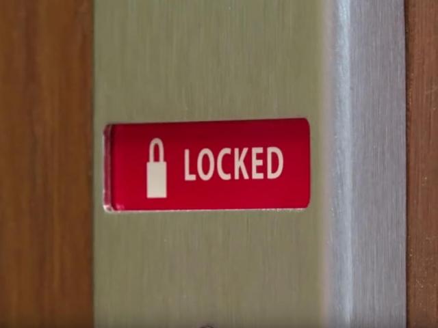a closed door indicating that it is locked
