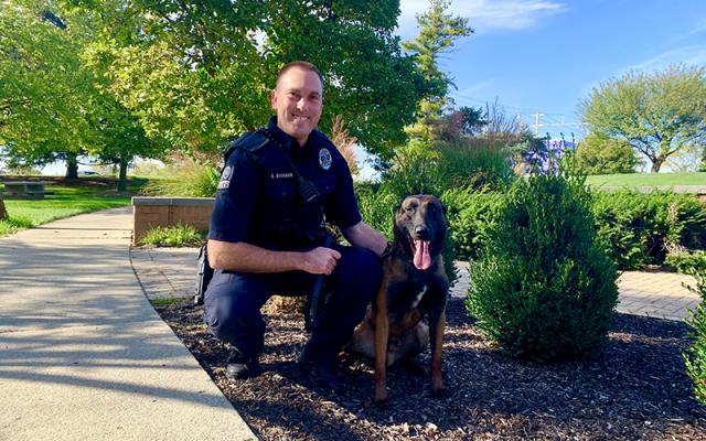 OSU Police officer next to K-9 Phenix