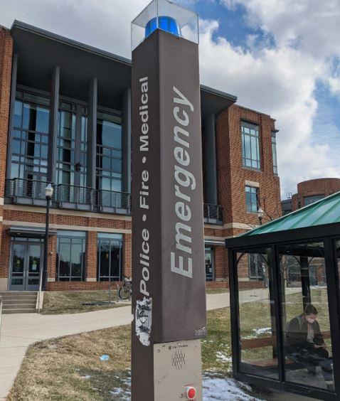 photo of blue light emergency phone in front of Ohio Union