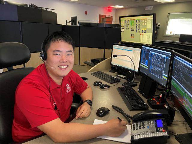 Photo of AVM staff member looking at security cameras