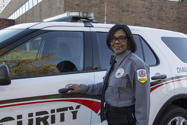Photo of security officer and vehicle