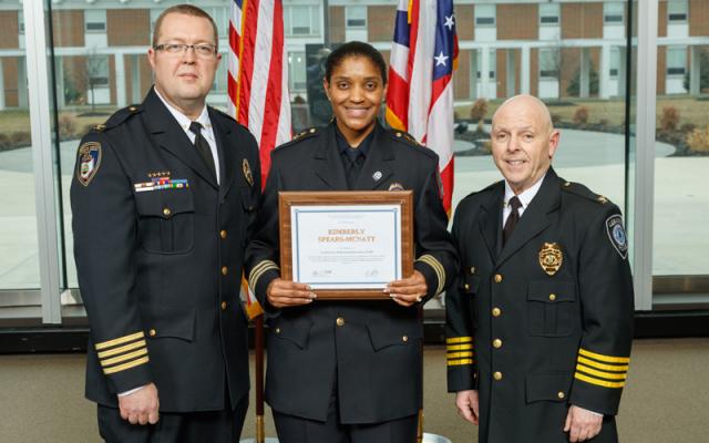 OSU Police Chief Spears-McNatt displays certificate from Law Enforcement Executive (CLEE) program