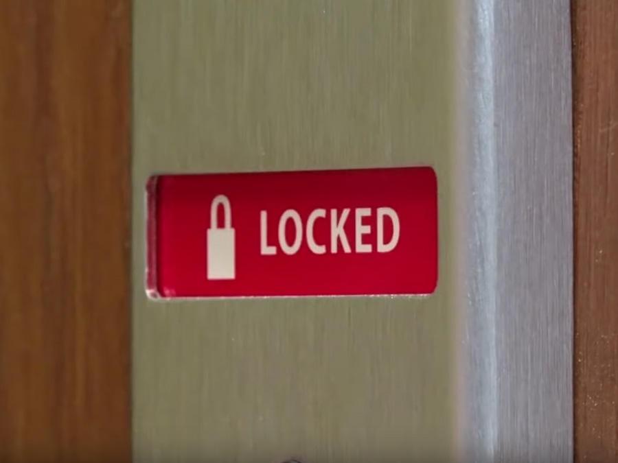 a closed door indicating that it is locked