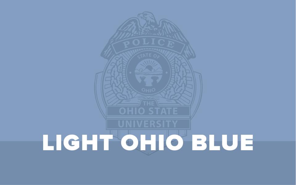 a sign of a police badge with the words in front of it, light ohio blue