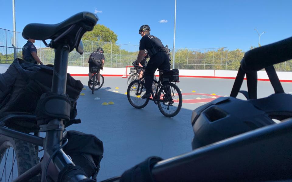 police officers riding bikes