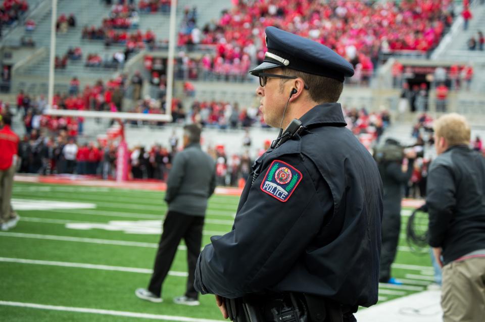 Officer inside stadium