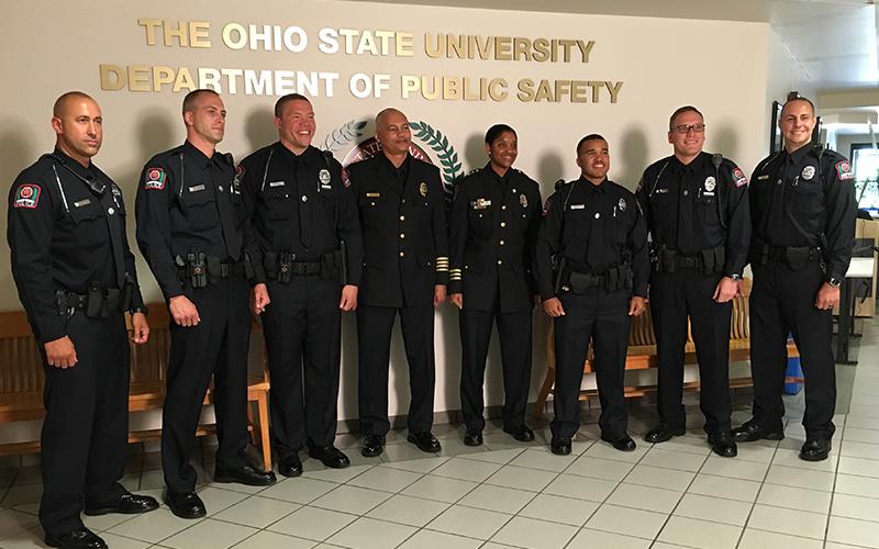 six new OSU Police officers stand alongside Chief Stone and Deputy Chief Spears-McNatt
