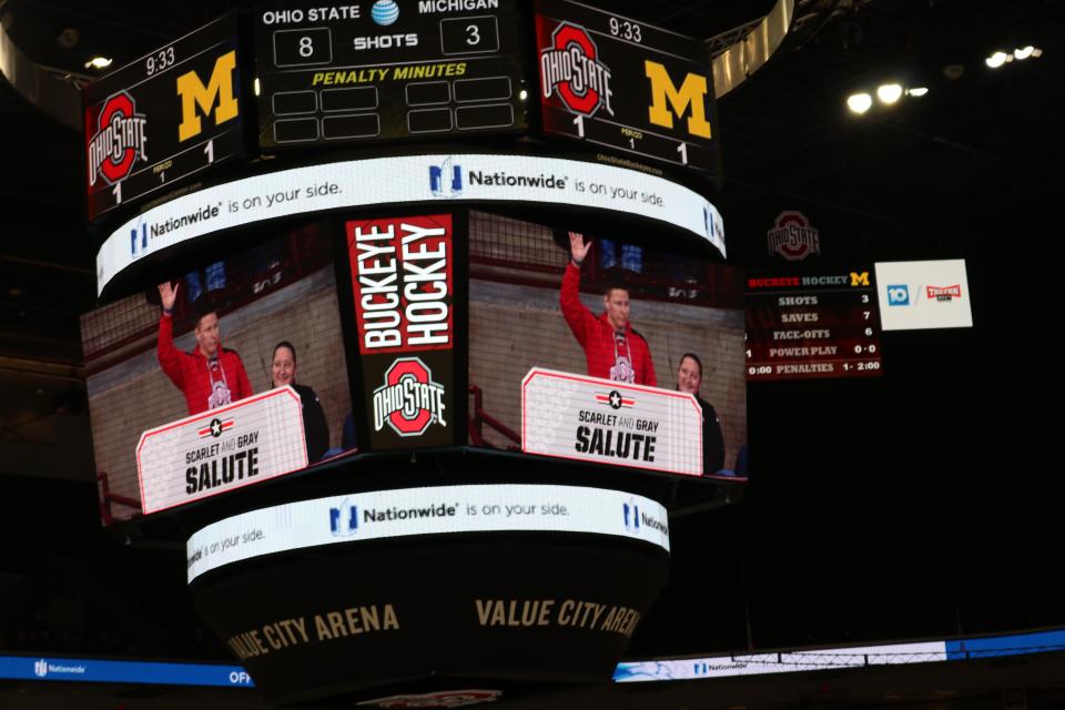 display board shows Officer Shaffer waving
